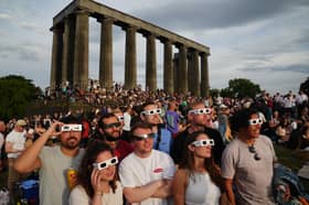 This lucky lot of sky watchers got eclipse glasses for the event