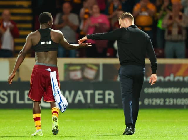 Motherwell Manager Alfred Johansson and Ibrahim Said celebrate their 2-0 victory during a UEFA Europa Conference League Third Qualifying Round Second Leg match between Motherwell and HJK Helsinki