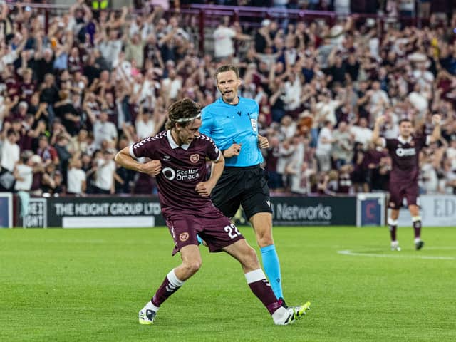 Hearts' Tomas Magnusson celebrates after opening the scoring against Benfica at Tynecastle. (Photo by Mark Scates / SNS Group)