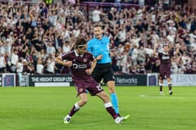 Hearts' Tomas Magnusson celebrates after opening the scoring against Benfica at Tynecastle. (Photo by Mark Scates / SNS Group)