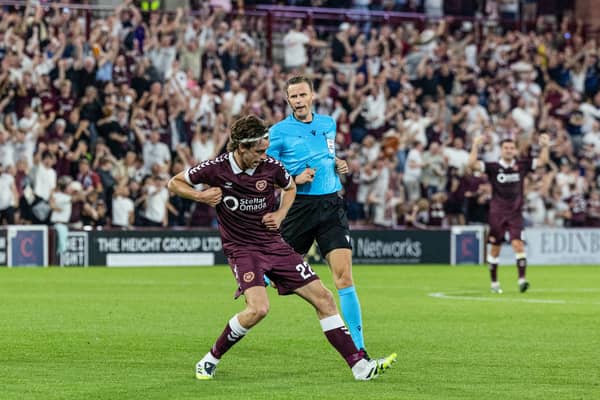Hearts' Tomas Magnusson celebrates after opening the scoring against Benfica at Tynecastle. (Photo by Mark Scates / SNS Group)