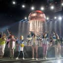 The giant teacake that featured in the opening ceremony is among the lots up for sale. Picture: PA