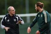 Celtic manager Martin O'Neill (L) and Kasper Hogh