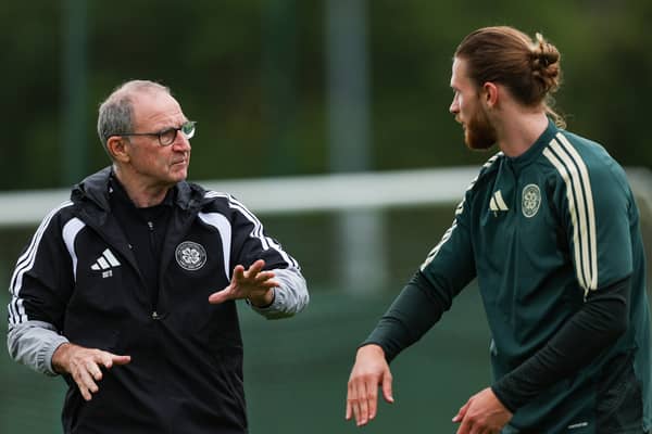 Celtic manager Martin O'Neill (L) and Kasper Hogh