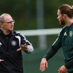 Celtic manager Martin O'Neill (L) and Kasper Hogh
