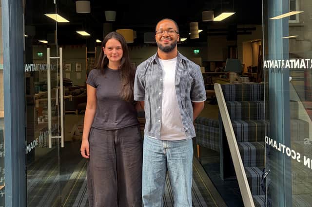 Rachel Walsh and Raheem Rogers outside Anta on Rose Street