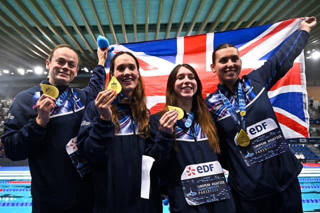 Team Great Britain (LtoR) Lauren Cox, Angharad Evans, Keanna Macinnes and Freya Colbert pose with their gold medals after the women's 4x100m medley relay swimming event during the LEN European Aquatics Championships at the Olympic Aquatic Centre in Saint-Denis, northern suburbs of Paris, on August 16, 2026.