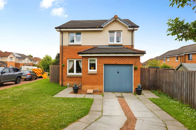 The detached home on Fivestanks Court combines a private setting with driveway parking and a garage