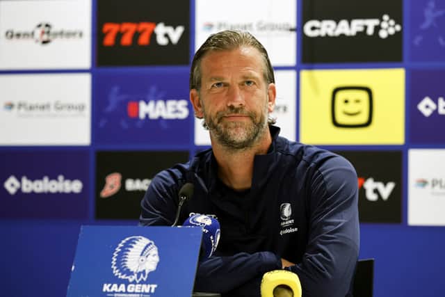 KAA Gent's Belgian head coach Rik De Mil looks on as he delivers a press conference ahead of the Conference League play-off round first-leg match against Hibs.