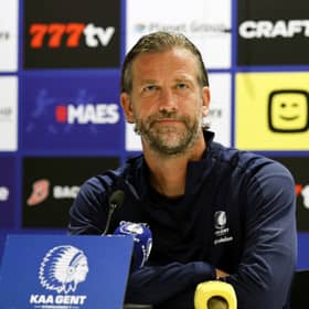 KAA Gent's Belgian head coach Rik De Mil looks on as he delivers a press conference ahead of the Conference League play-off round first-leg match against Hibs.