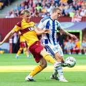 Motherwell's Oscar Priestman and Helsinki's Alexander Ring in action