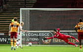 Freiburg's Matthias Ginter scores from the penalty spot to make it 2-1 during a UEFA Conference League Playoff Round First Leg match between Motherwell and Freiburg