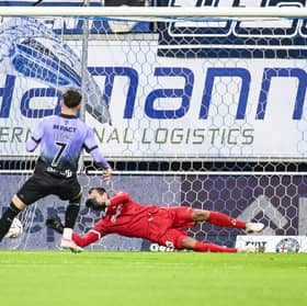 Hibs striker Owen Elding has his penalty saved by Gent goalkeeper Davy Roef during the first leg of the play-off round for the UEFA Conference League group phase.