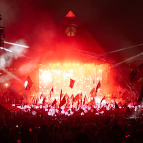 Who will headline the iconic Pyramid Stage at Glastonbury next year?