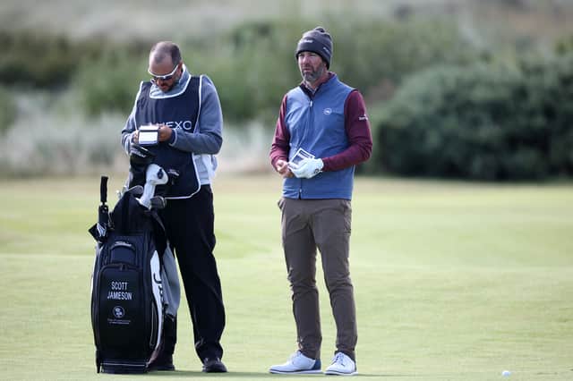 Scott Jamieson and his caddie talk tactics on the 10th hole at Trump International Golf Links