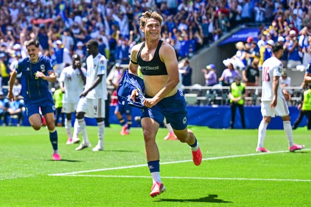 Celtic target Ermin Mahmic celebrates after scoring for Bosnia-Herzegovina against Qata at the 2026 World Cup.