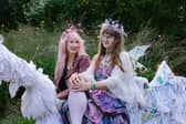 Revellers in flowers and fairy wings at Jupiter Rising experimental art festival