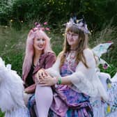 Revellers in flowers and fairy wings at Jupiter Rising experimental art festival
