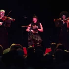 Scottish Ensemble & Brìghde Chaimbeul (centre)