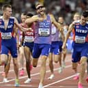 Josh Kerr, centre, enjoys a victory over Norwegian Jakob Ingebrigtsen, right, at the World Athletics Championships in Budapest in 2023. The pair will return to Hungary next month. 