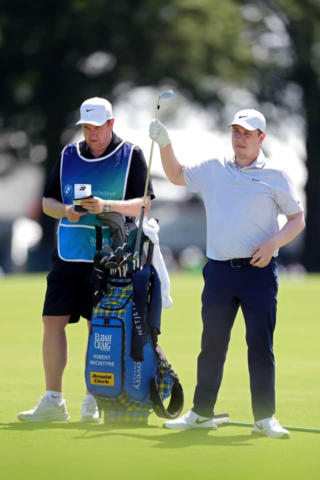 Bob MacIntyre selects a club from his bag during the first round of last week’s BMW Championship at Bellerive Country Club in St Louis