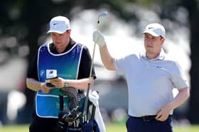 Bob MacIntyre selects a club from his bag during the first round of last week’s BMW Championship at Bellerive Country Club in St Louis