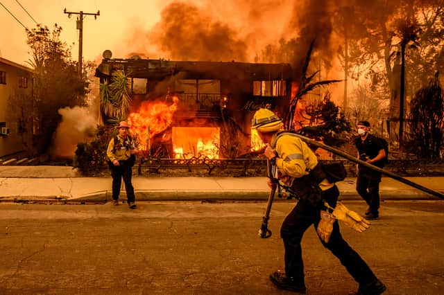 Last year's devastating wildfire in Los Angeles resulted in billions of pounds of damage, affecting insurance premiums (Picture: Josh Edelson)