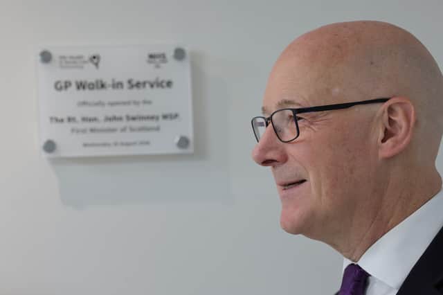 John Swinney has opened his government's latest GP walk-in clinic