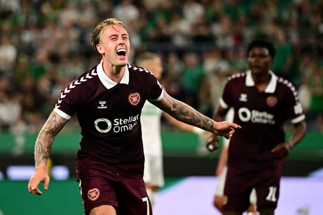 Calvin Miller celebrates after volleying Hearts in front during extra-time in the Conference League play-off second leg against Rapid Vienna.  (Photo by Christian Bruna/Getty Images)