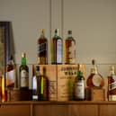 A cross section of the Johnnie Walker collection that'll be auctioned in September