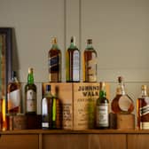 A cross section of the Johnnie Walker collection that'll be auctioned in September
