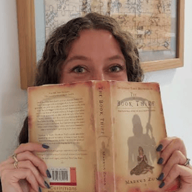 Political Correspondent Rachel Amery with a copy of The Book Thief.