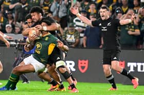Sacha Feinberg-Mngomezulu of South Africa is tackled during the Rugby's Greatest Rivalry tour against New Zealand at Ellis Park on August 22, 2026 in Johannesburg. 