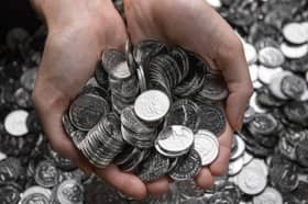 New 10p coins bearing the King’s portrait have entered circulation for the first time, as reports suggest the use of cash is rising.
