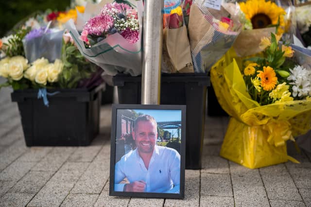 Floral tributes left at Cleveland Police Central Headquarters Memorial Garden in Middlesbrough, England after PC Matthew Blades, pictured, and PC Tom Clough were killed in a head-on collision on the A66 (Picture: Ian Forsyth)