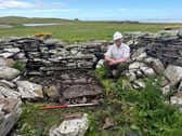 Gordonstoun teacher Dan McLean at an excavation site where the remains of what is thought to be a medieval Viking church about 1,000 years old was discovered 