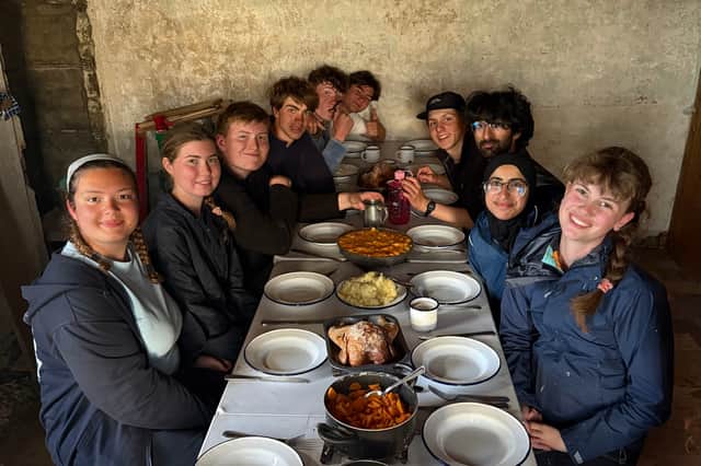 A group of students who discovered what is thought to be a medieval Viking church