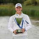 Joe Dean shows off his trophy after winning at The Belfry.