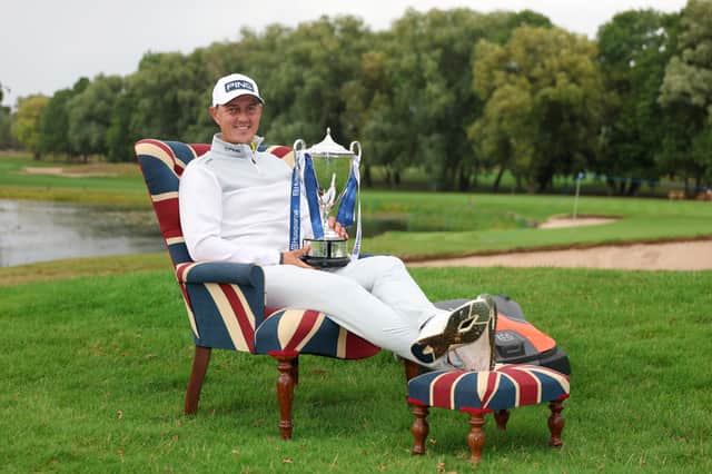 Joe Dean poses with the trophy following his victory in the Husqvarna British Masters hosted by Sir Nick Faldo at The Belfry on Sunday