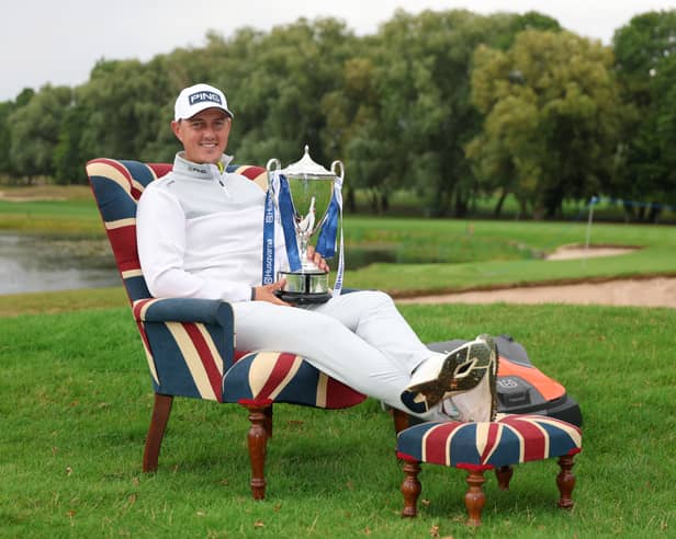 Joe Dean poses with the trophy following his victory in the Husqvarna British Masters hosted by Sir Nick Faldo at The Belfry on Sunday 