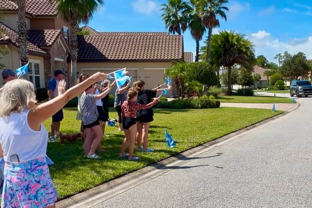 Neighbours waving Saltires lined the street as Scott Jamieson arrived at his home in Ponte Vedra Beach
