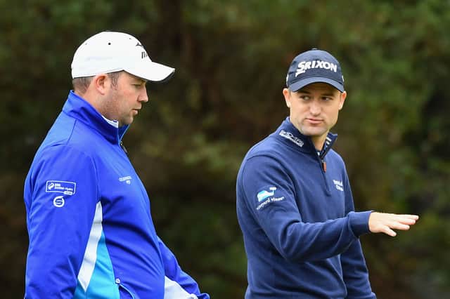 Fellow Highlanders Duncan Stewart  and Russell Knox pictured during the 2016 World Cup of Golf at Kingston Heath Golf Club in Melbourne