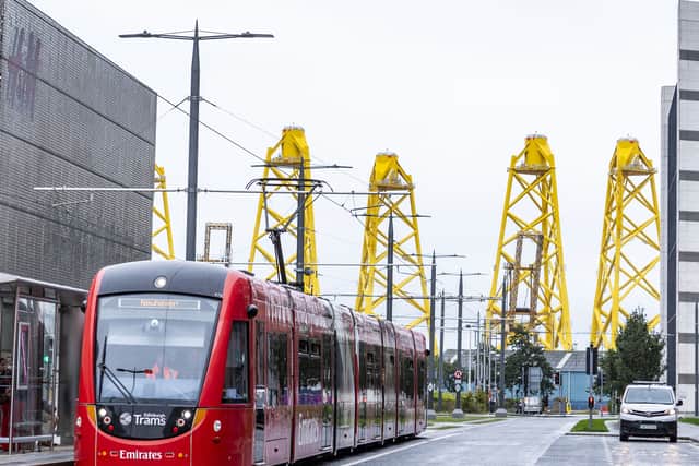 The giant yellow structures visible at the Port of Leith are massive steel foundations and transition pieces for the Inch Cape Offshore Wind Farm.