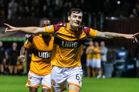 New Motherwell signing Dylan Levitt celebrates after scoring to make it 3-0 against his former club, Dundee United