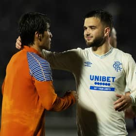 Rangers midfielder Nicolas Raskin and forward Minsu Kim at full-time after the 2-1 win over Falkirk. (Photo by Craig Foy / SNS Group)