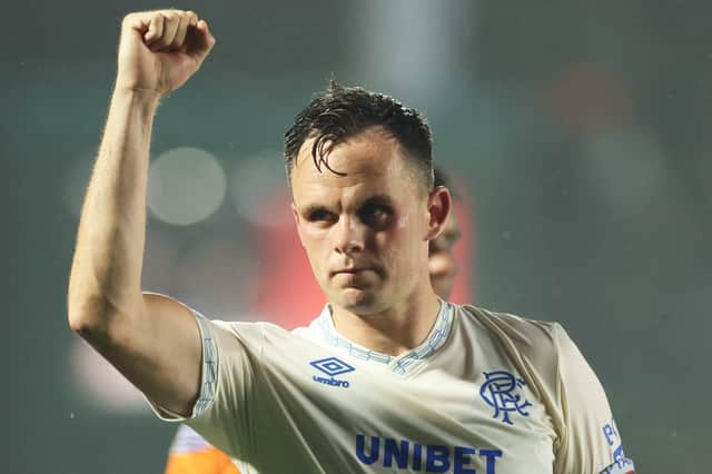 Lawrence Shankland scored twice as Rangers defeated Falkirk 2-1 on Wednesday night.