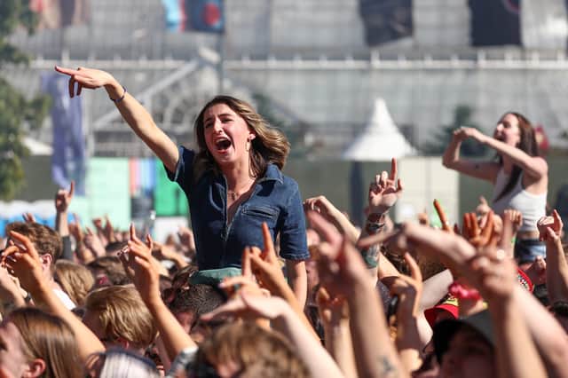 Fans singing along to Fontaines D.C. during their set at TRNSMT at Glasgow Green in 2022. 