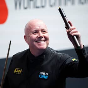 John Higgins is hoping to bag a quarter-final place today.