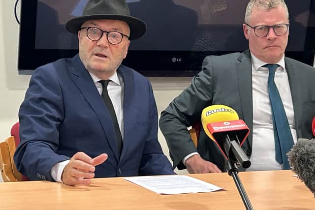 Former MP George Galloway (left) and his solicitor, Kevin Winter (right) of KRW Law, speak to media in 2025.