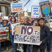 Anti-data centre protesters gather outside the Scottish Parliament